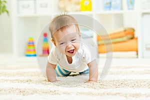 Funny crawling baby boy