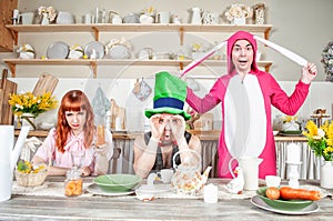 Funny crazy friends having fun and fool around with mad tea party concept