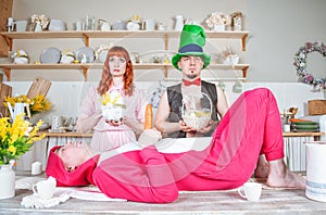 Funny crazy group of friends having fun with mad tea party concept