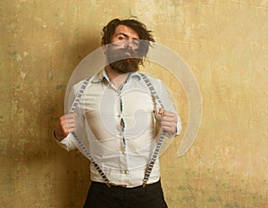 Funny crazy guy man his suspenders feel candid face expression. Bearded man with uncombed disheveled hair.