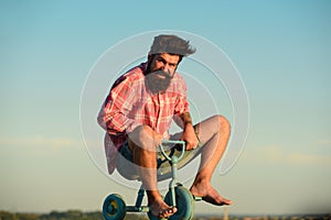 Funny crazy man bicyclist riding a bike.