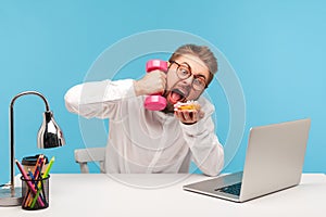 Funny crazy man office worker holding dumbbell but wanting to eat sweet donut ignoring training, temptation, unhealthy eating
