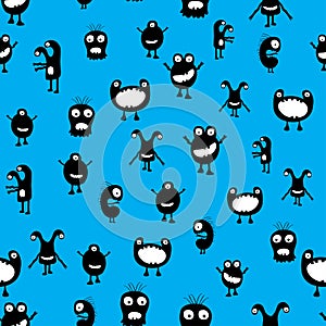 Funny and crazy monsters seamless pattern on blue background