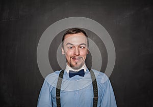 Funny crazy teacher or business man on blackboard