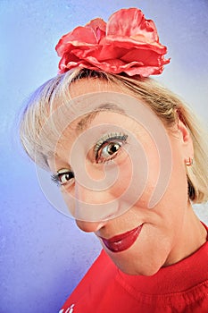 Funny cunning woman on vivid color background