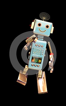 Funny cute robot toy on black