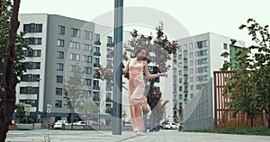 Funny dancing girl in the street.