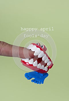 Funny denture and text happy april fools day
