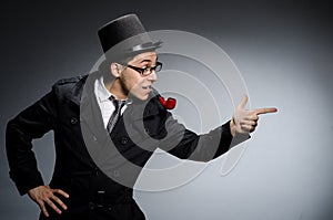 Funny detective with pipe