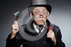 Funny detective with pipe