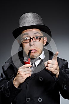 Funny detective with pipe