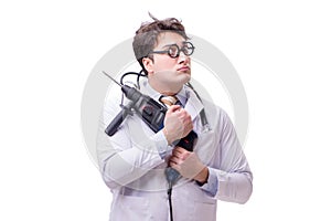 The funny doctor with drill isolated on white