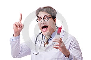 The funny doctor with syringe isolated on white