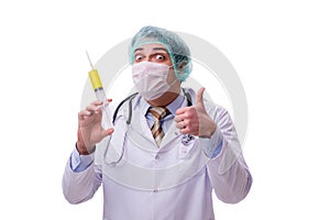 The funny doctor with syringe isolated on white