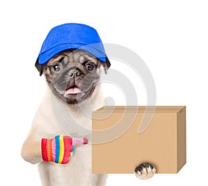 Funny dog delivering a big package and points index finger. isolated on white background