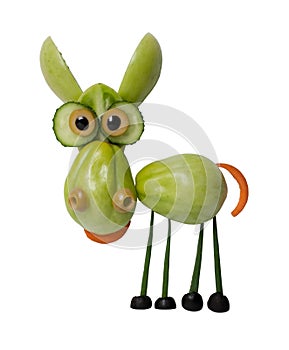 Funny donkey made of green tomato