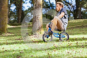 Funny downhill on small kids balance bike