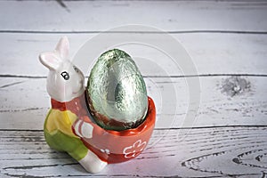 Funny Easter background with bunny, sheep and Easter eggs. Letter of wishes for Easter. With cospyspaces