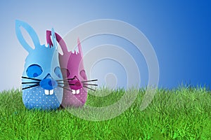 Funny Easter bunny couple on grass