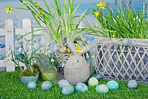 Funny easter bunny in garden