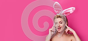 Funny Easter bunny woman calling with cell phone. Easter banner, mockup copy space, header for website, template.