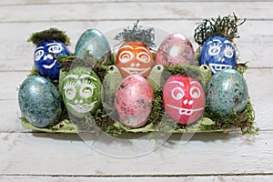 Funny easter eggs on white boards