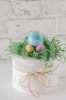 Funny easter present: Toilet paper roll with easter decoration