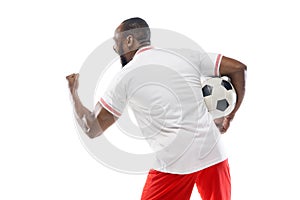 Funny emotions of professional football, soccer player isolated on white studio background, excitement in game