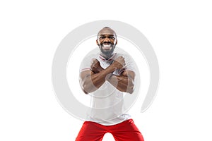 Funny emotions of professional football, soccer player isolated on white studio background, excitement in game