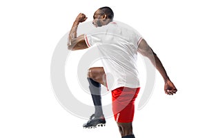 Funny emotions of professional football, soccer player isolated on white studio background, excitement in game