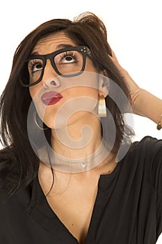 Funny expression woman puckered lips wearing geek glasses