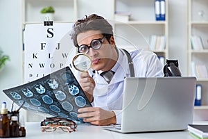 The funny eye doctor in humourous medical concept