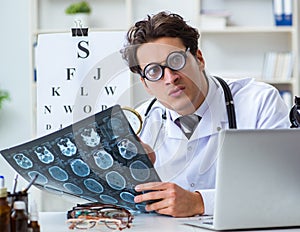 Funny eye doctor in humourous medical concept