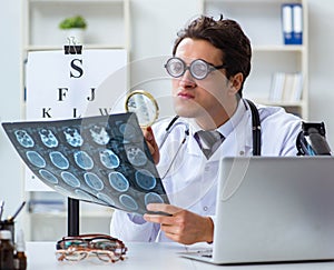 Funny eye doctor in humourous medical concept