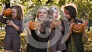 Funny face with Halloween pumpkins