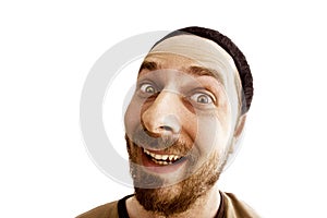 Funny face of joyful weird man isolated on white