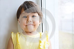 Funny face little girl portrait. happy smiling child