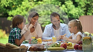 Funny family fooling, fast pizza eating challenge for children, competitiveness