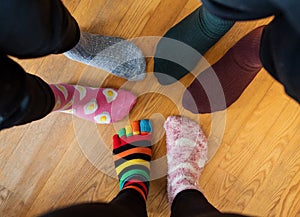 Funny family legs in mismatched socks