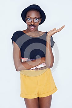 Funny, fashion and portrait of black woman with mustache in studio with hipster in white background. Silly, nerd and