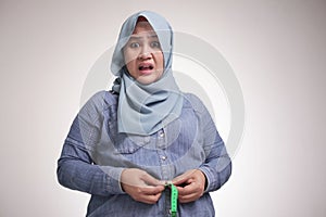 Funny Fat Asian Muslim Woman Measuring Waist