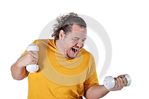 Funny fat man exercising with dumbbells and looking at camera isolated on white background