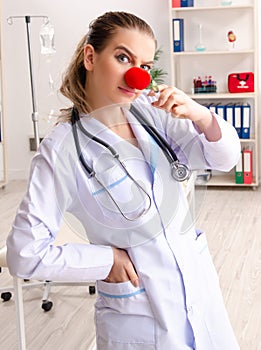 Funny female doctor working in the clinic