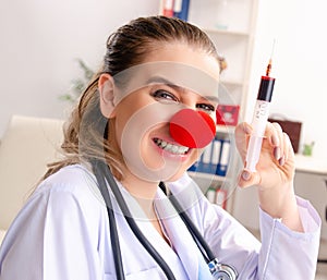 Funny female doctor working in the clinic