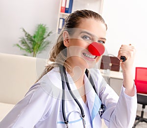 Funny female doctor working in the clinic