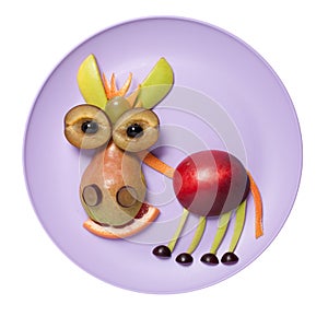 Funny fruit donkey compiled on purple plate
