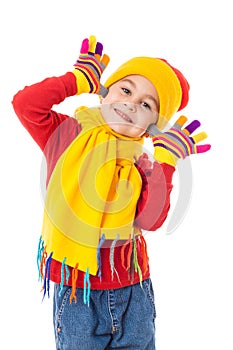 Funny girl in colorful winter clothes showing joke