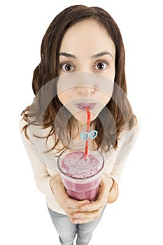 Funny girl drinking smoothie