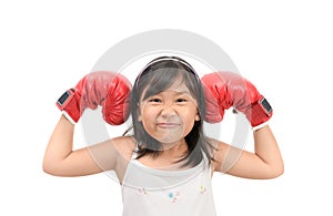 Funny girl fighting with red boxing gloves isolated