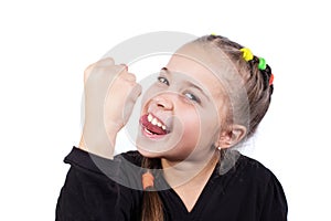 Funny girl with fist. Girl shows tounge and fist